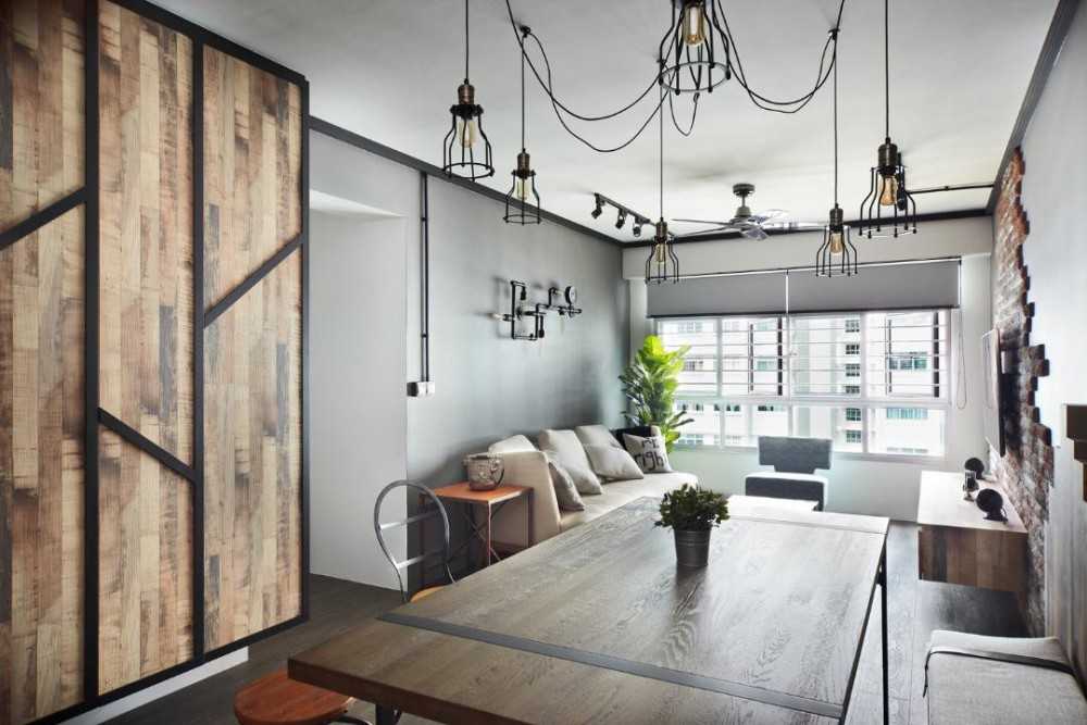 Industrial Dining Room with Drop Light and Dining Table
