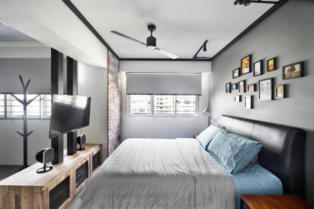 Industrial Bedroom with Feature Wall and Ceiling Fan
