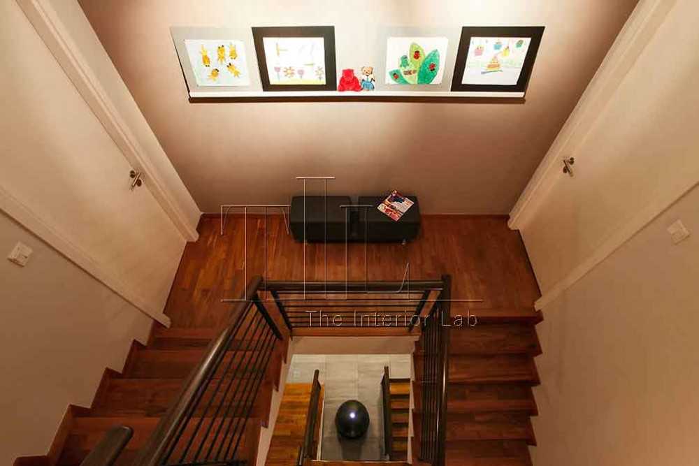 Transitional Hallway with Staircase and Artwork
