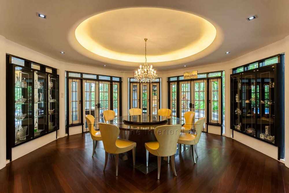 Contemporary Dining Room with Wood Flooring and Cove Lighting