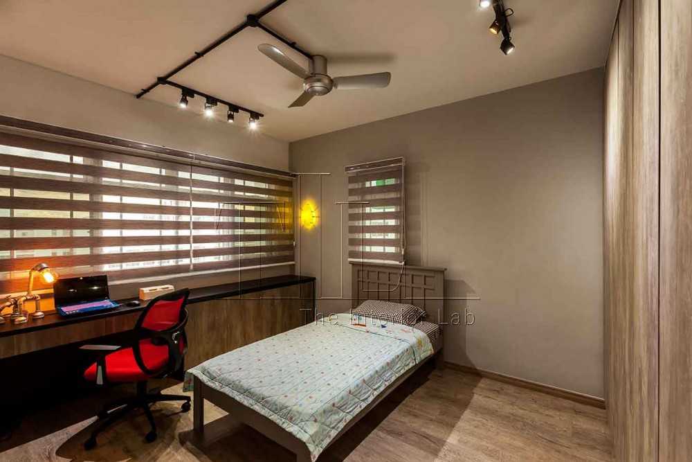 Industrial Bedroom with Bay Window and Desk
