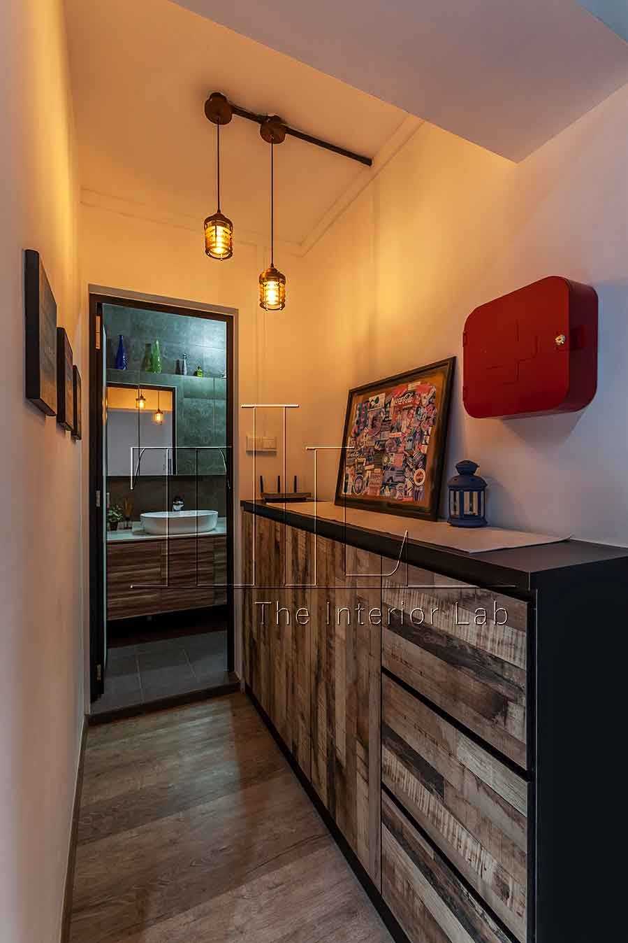 Industrial Hallway with Bookshelf and Artwork
