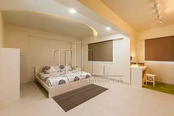 Minimalist Bedroom with Bay Window and Cove Lighting