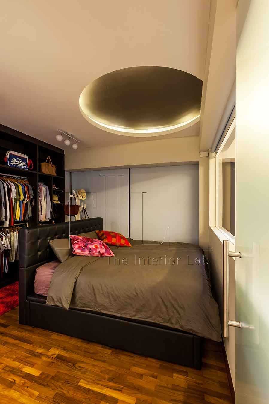 Modern Bedroom with Wood Flooring and Cove Lighting