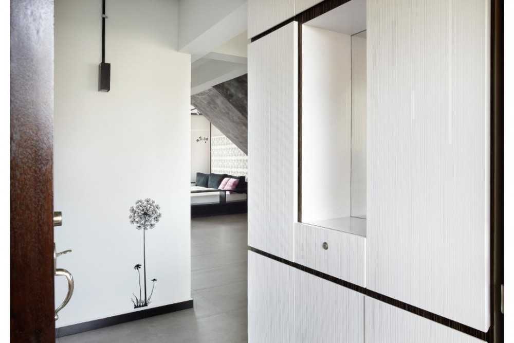Industrial Hallway with Storage Cabinets and Doors