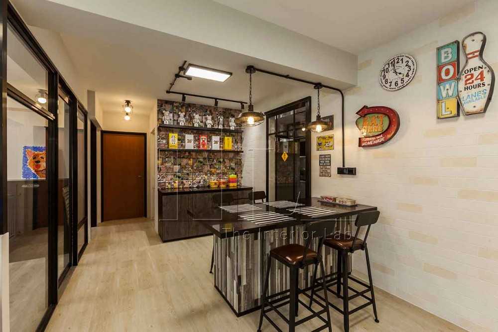 Industrial Dining Room with Drop Light and Artwork