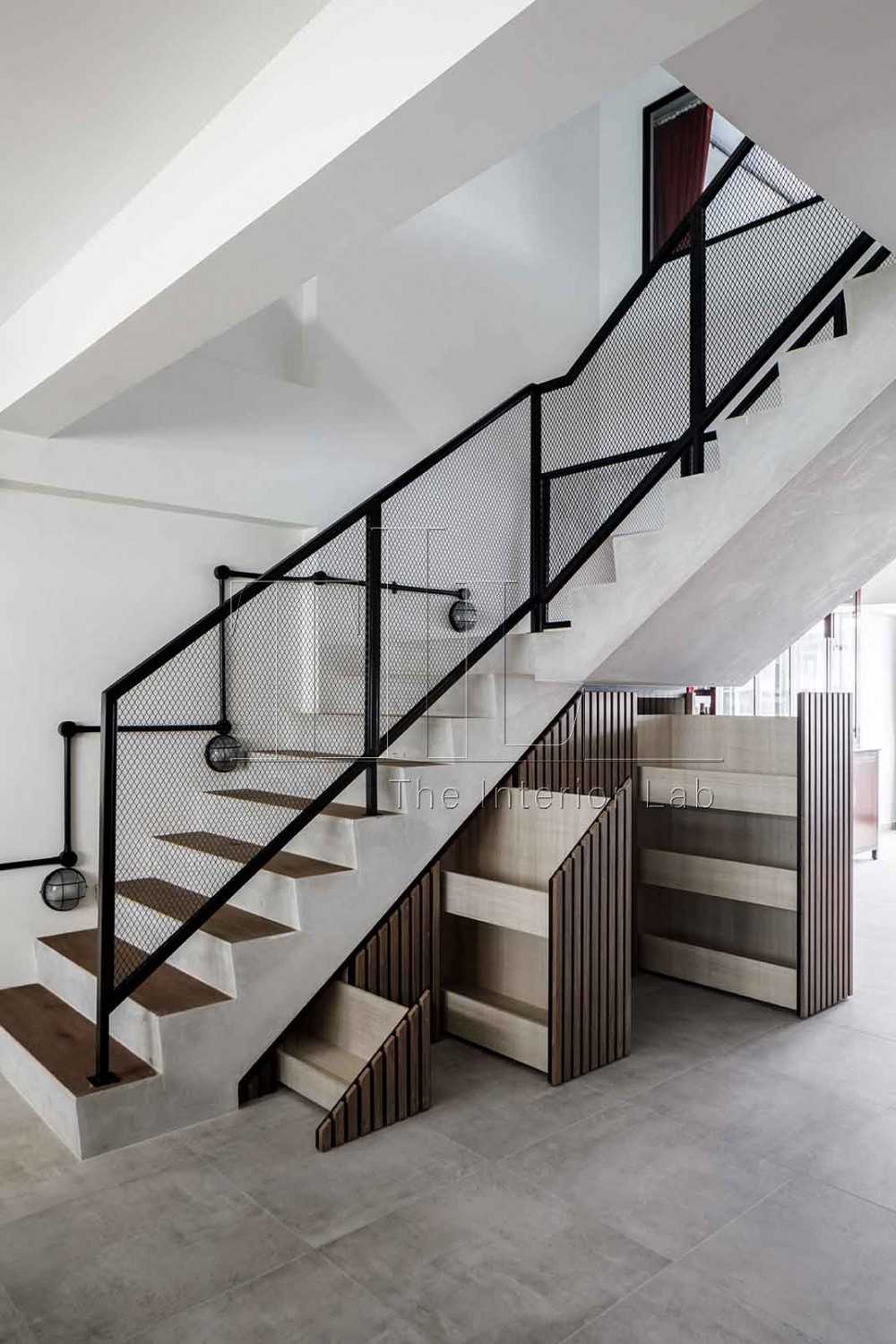 Industrial Mezzanine with Staircase and Storage Cabinets