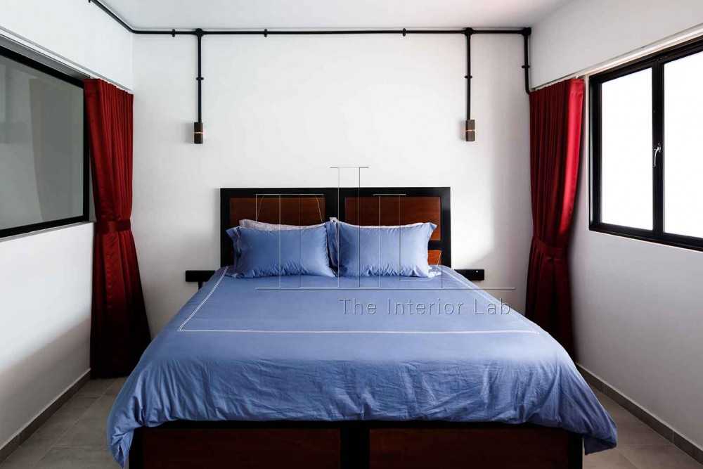 Industrial Bedroom with Feature Wall and Wardrobe