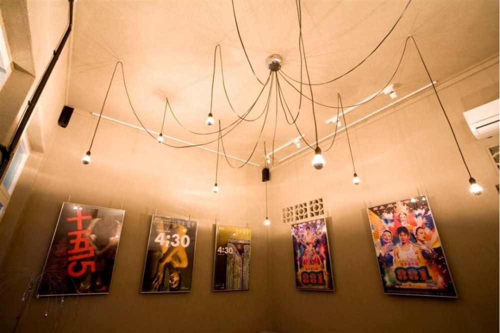 Eclectic Foyer with Drop Light and Paintings