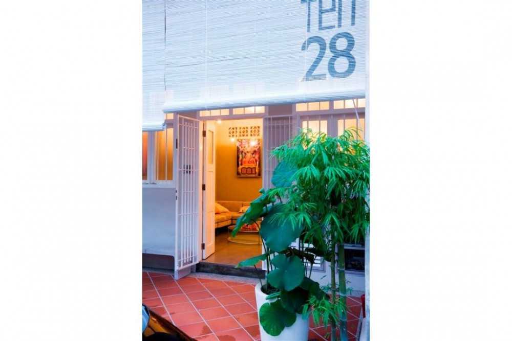 Eclectic Shopfront with Roller Blinds and Planters
