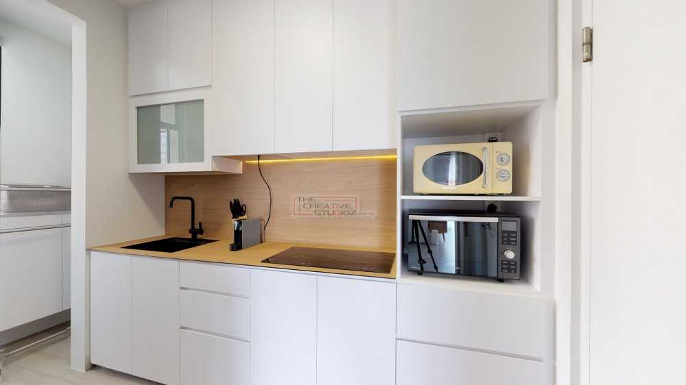 Minimalist Kitchen with Countertop and Herringbone Tiling
