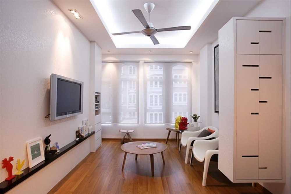 Eclectic Living Room with Wood Flooring and Coffee Table