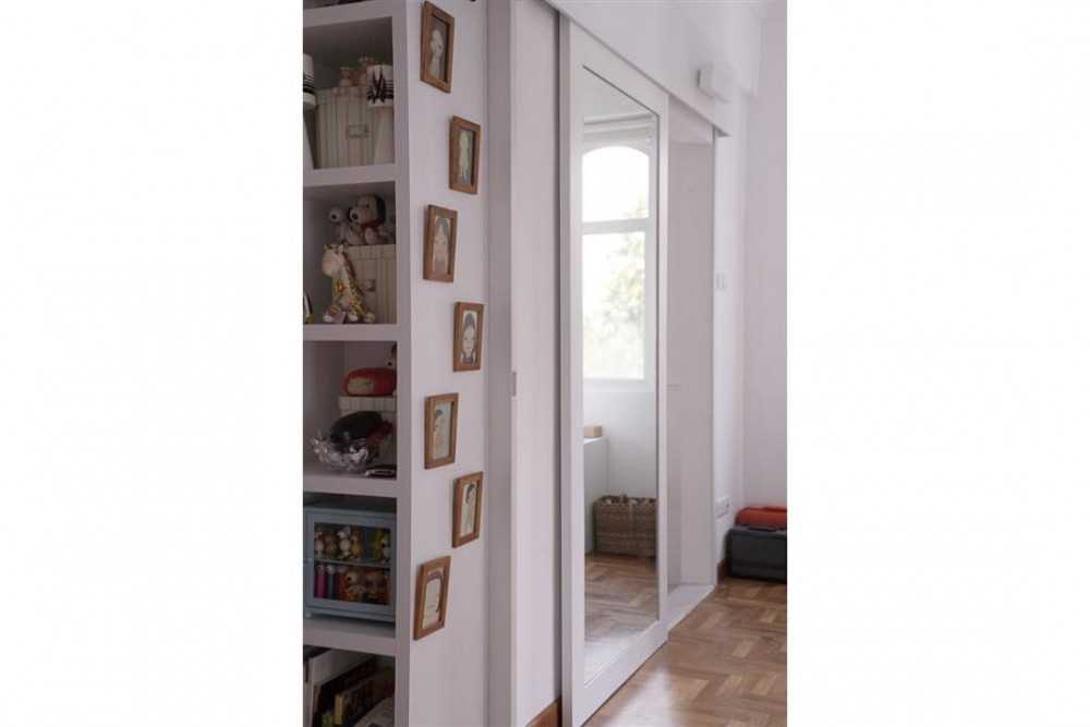 Eclectic Living Room with Mirror and Bookcases