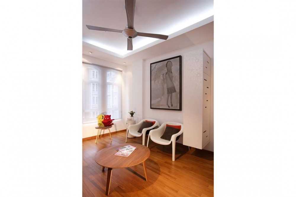 Eclectic Living Room with Ceiling Fan and Armchairs