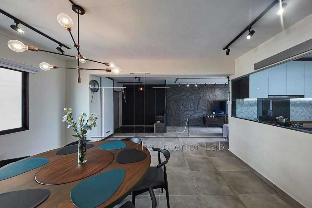 Eclectic Dining Room with Drop Light and Open Kitchen