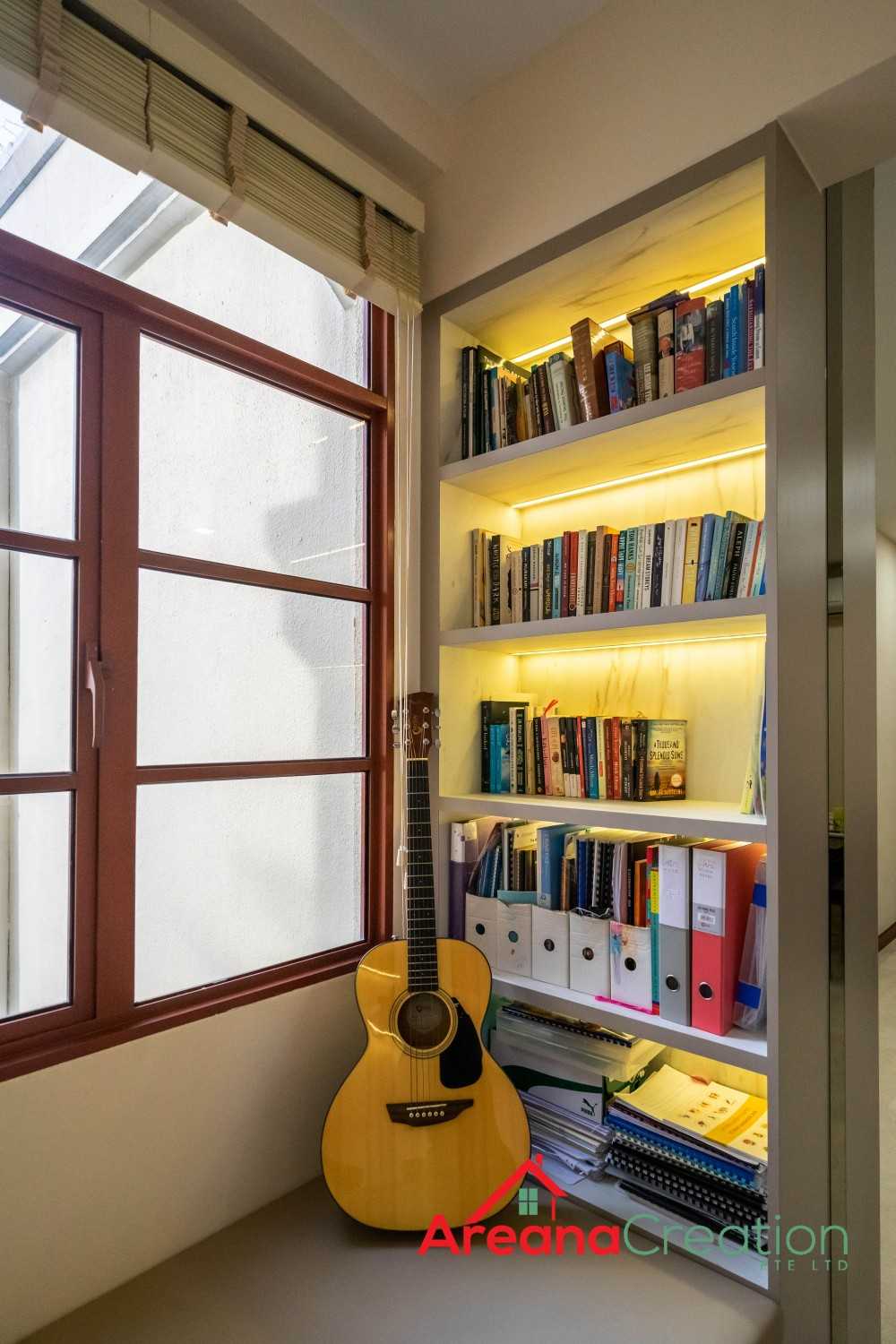 Modern Living Room with Bookshelf and Settee