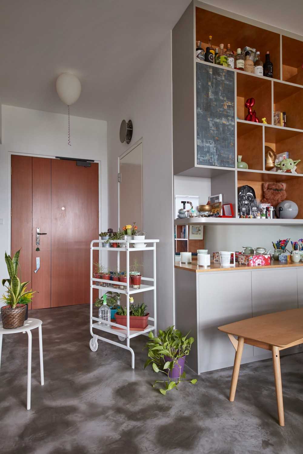 Eclectic Entryway with Seating Bench and Planters