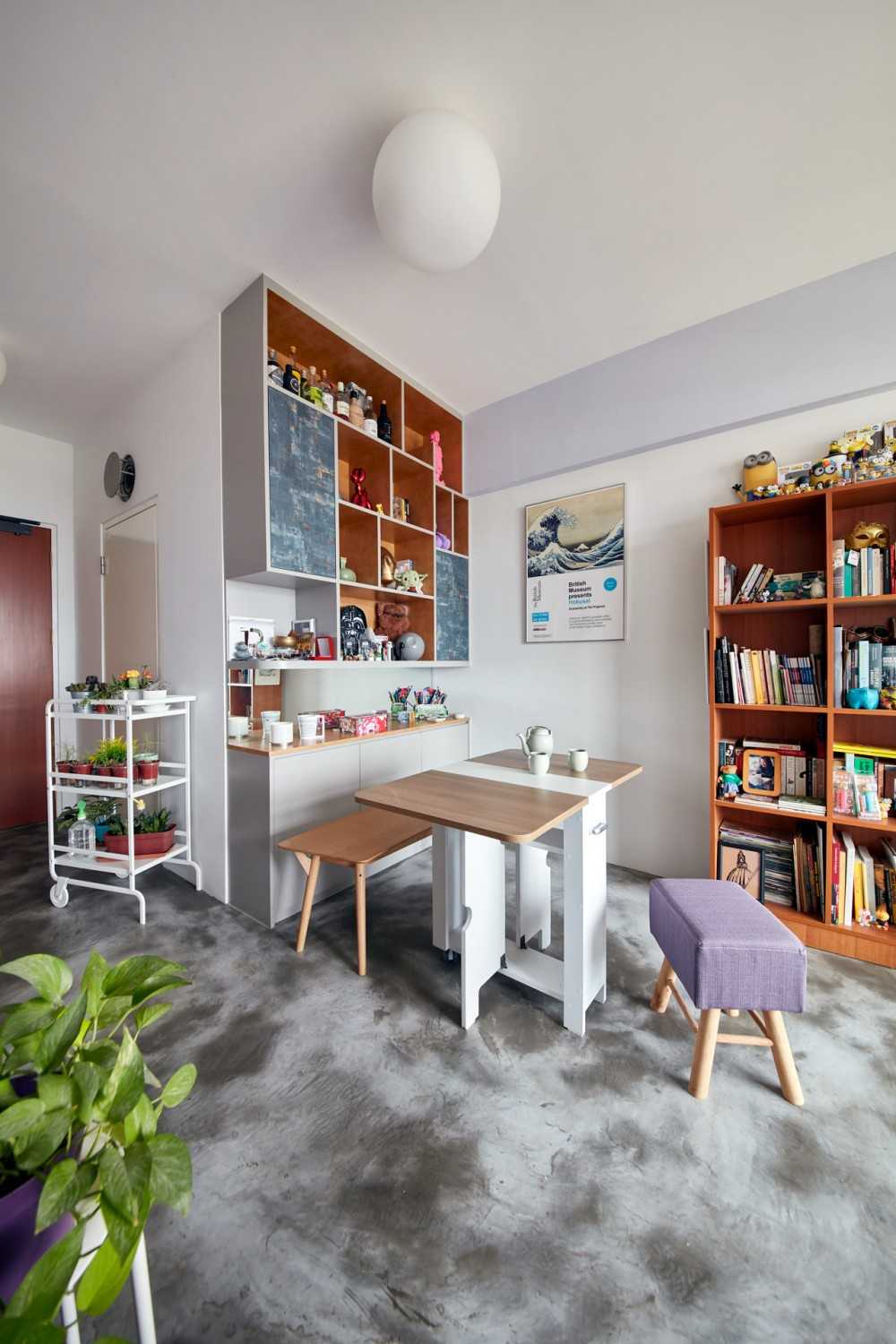 Eclectic Dining Room with Cement Floor and Dining Table