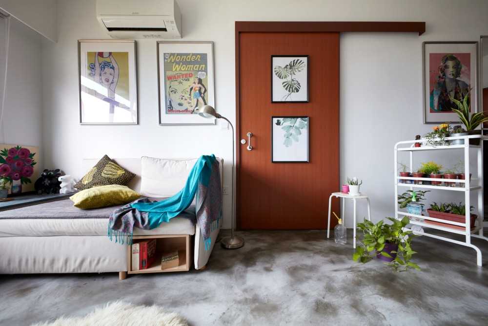 Eclectic Living Room with Cement Floor and Sofa