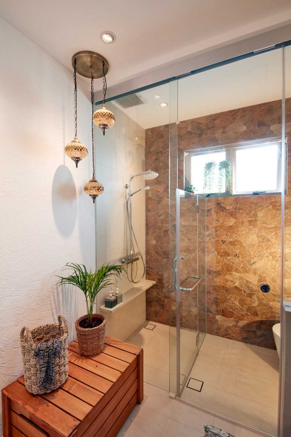 Country Bathroom with Drop Light and Showers