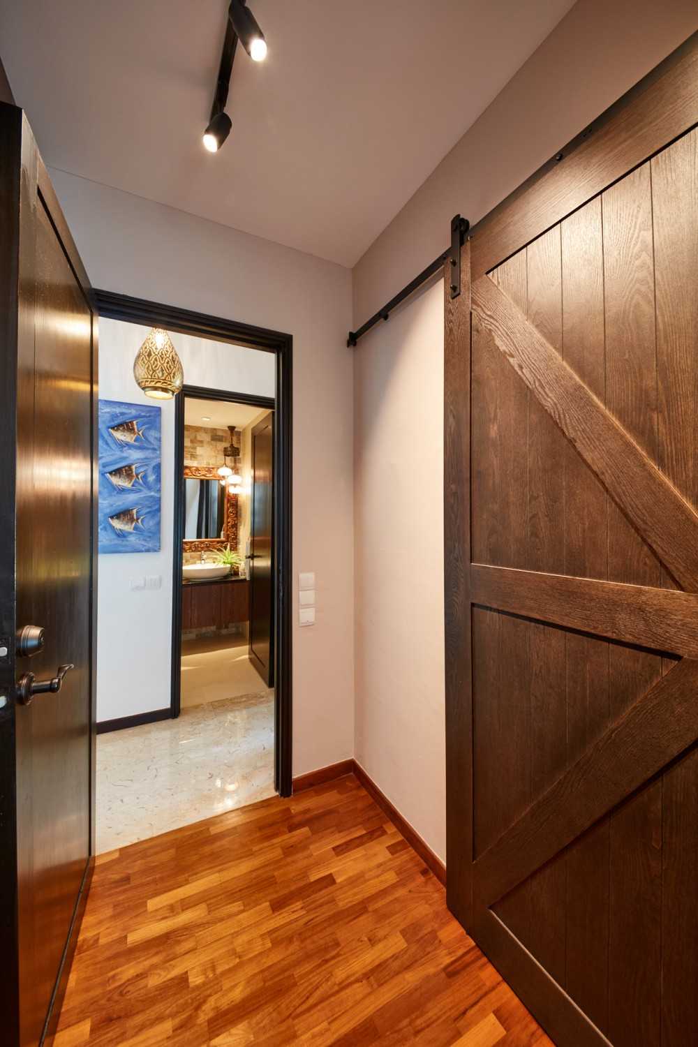 Country Hallway with Wood Flooring and Flooring