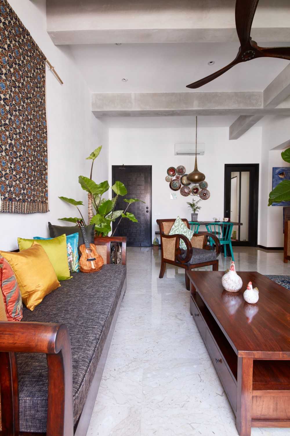 Country Living Room with Ceiling Fan and Sofa