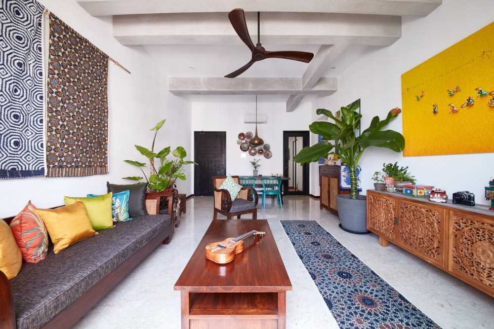Country Living Room with Ceiling Fan and Sofa