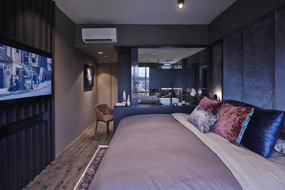 Contemporary Bedroom with Vinyl Flooring and Ceiling Light