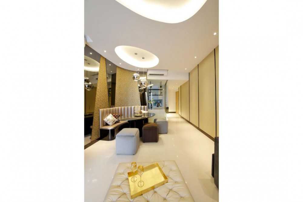 Contemporary Dining Room with Cove Lighting and Stools