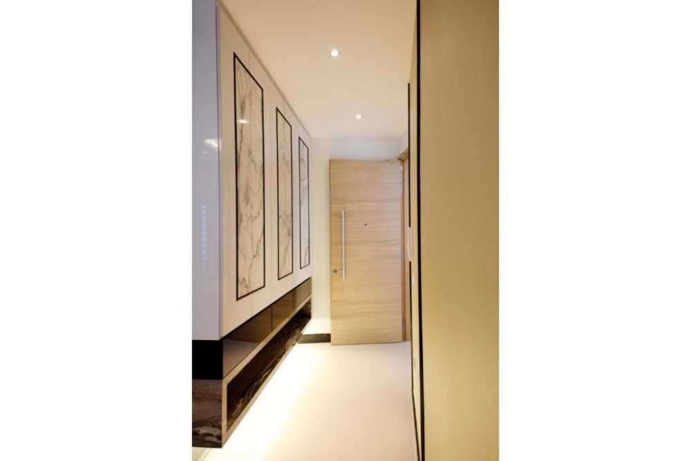 Contemporary Entryway with Feature Wall and Shoe Cabinets