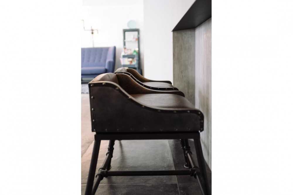 Industrial Kitchen with Bar Counter and Bar Stool