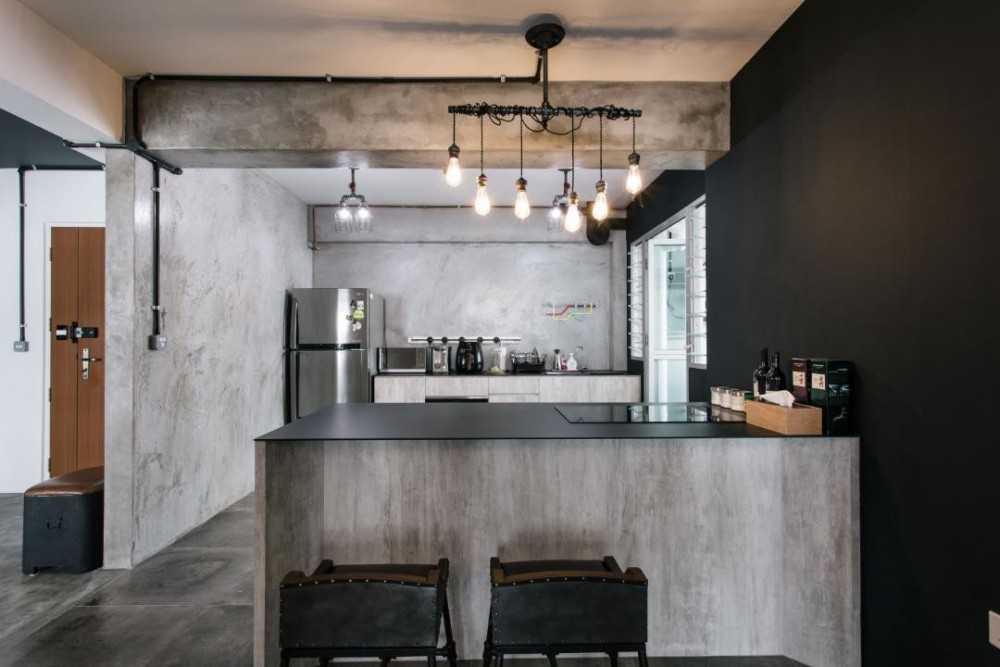 Industrial Kitchen with Drop Light and Bar Counter