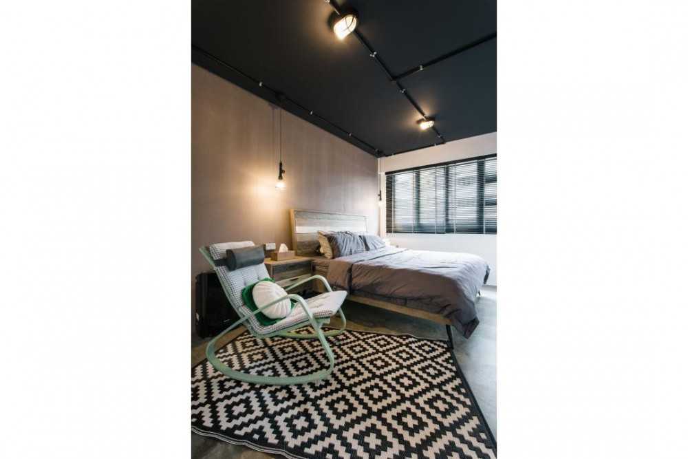 Industrial Bedroom with Armchairs and Queen Bed