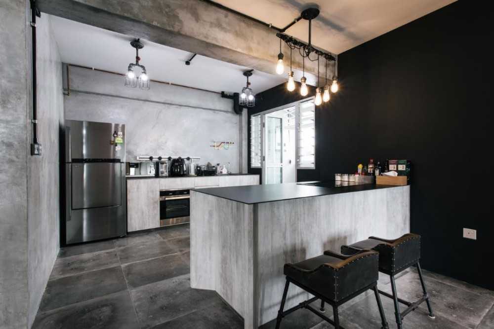Industrial Kitchen with Drop Light and Bar Counter
