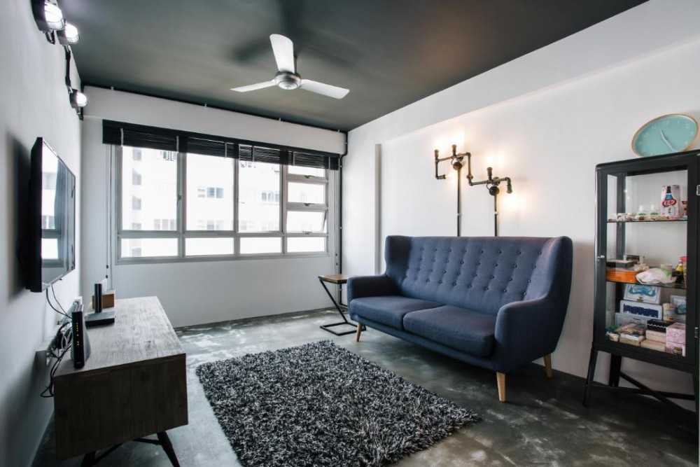 Industrial Living Room with Cement Floor and TV Console
