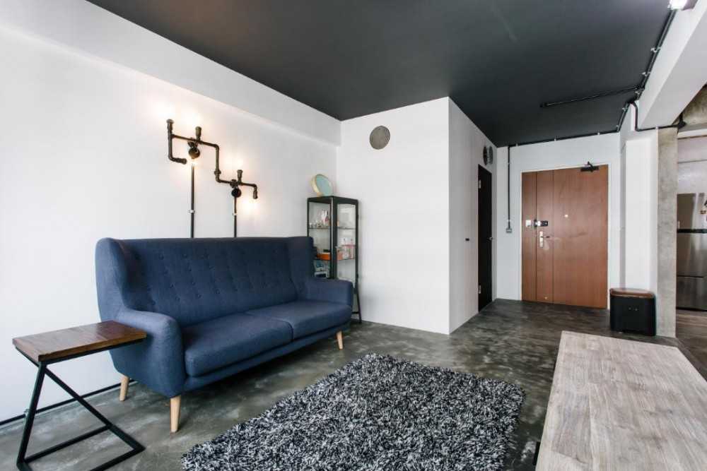 Industrial Living Room with Sofa and Side Table