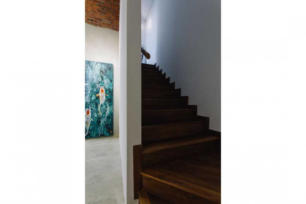 Minimalist Hallway with Staircase and Artwork