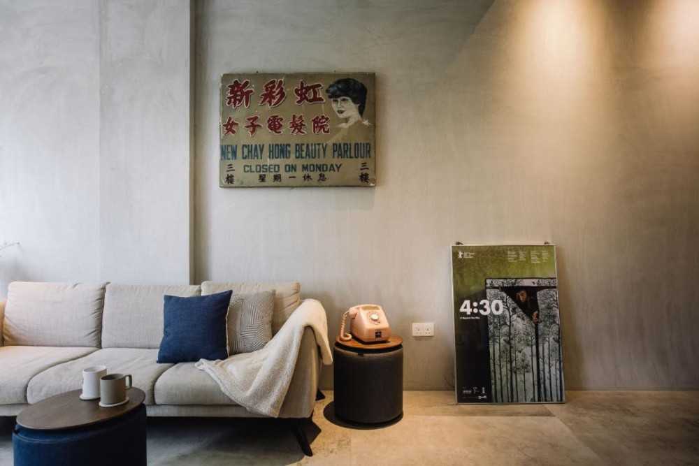 Minimalist Living Room with Cement Floor and Sofa