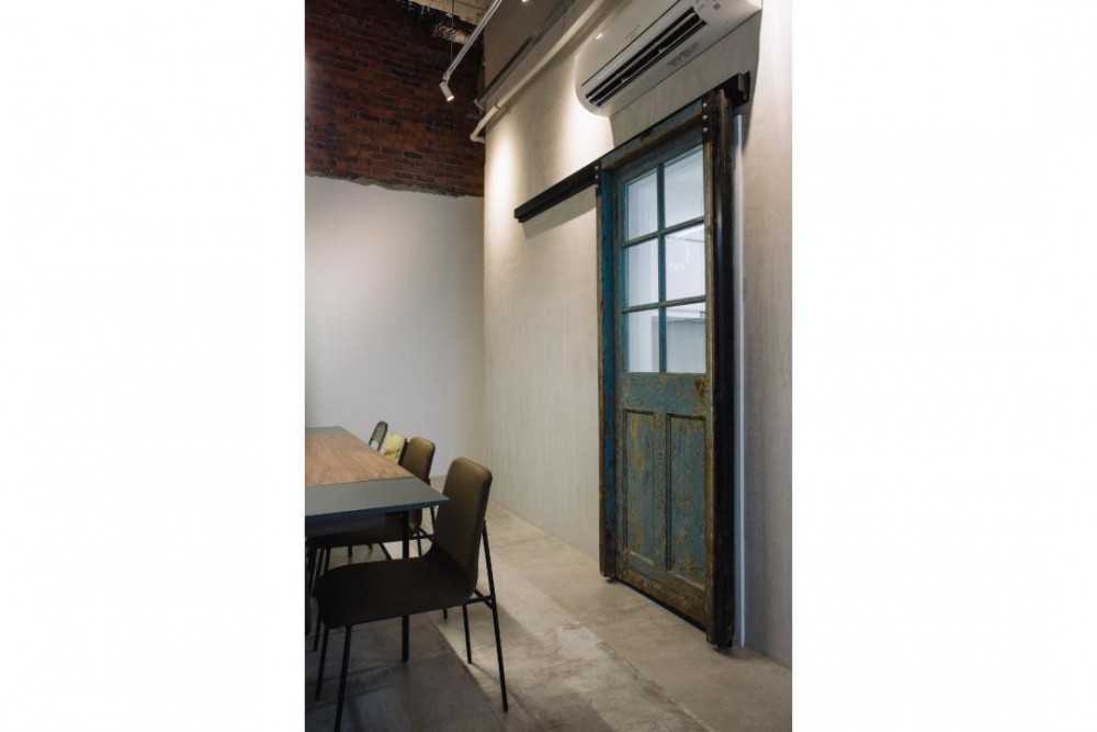 Minimalist Dining Room with Cement Floor and Flooring