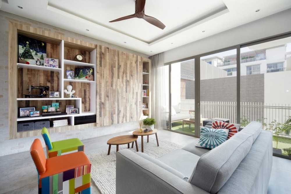 Eclectic Living Room with Feature Wall and Cove Lighting
