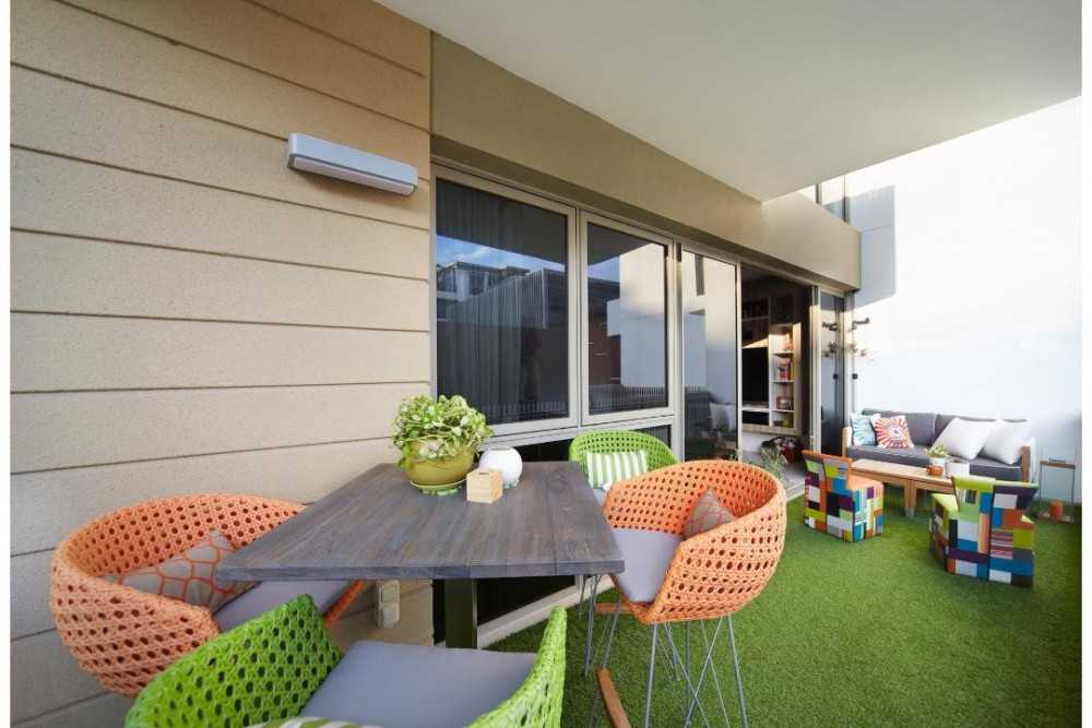 Eclectic Balcony with Outdoor Chairs and Outdoor Cushions