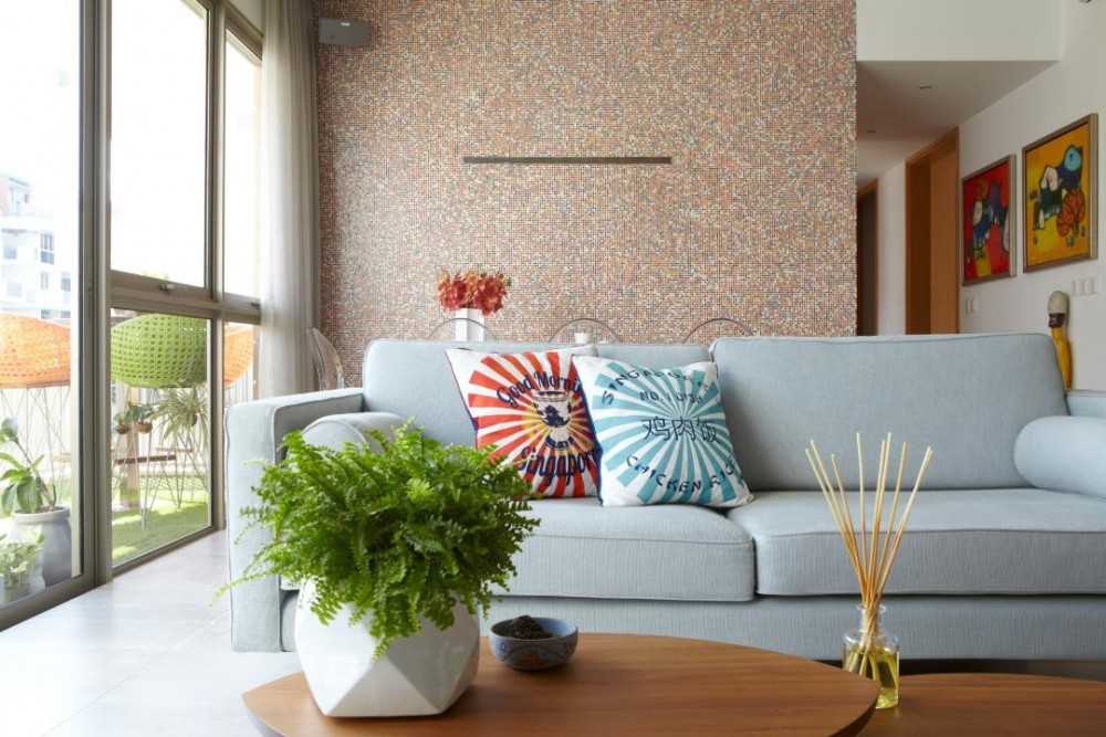 Eclectic Living Room with Feature Wall and Sofa