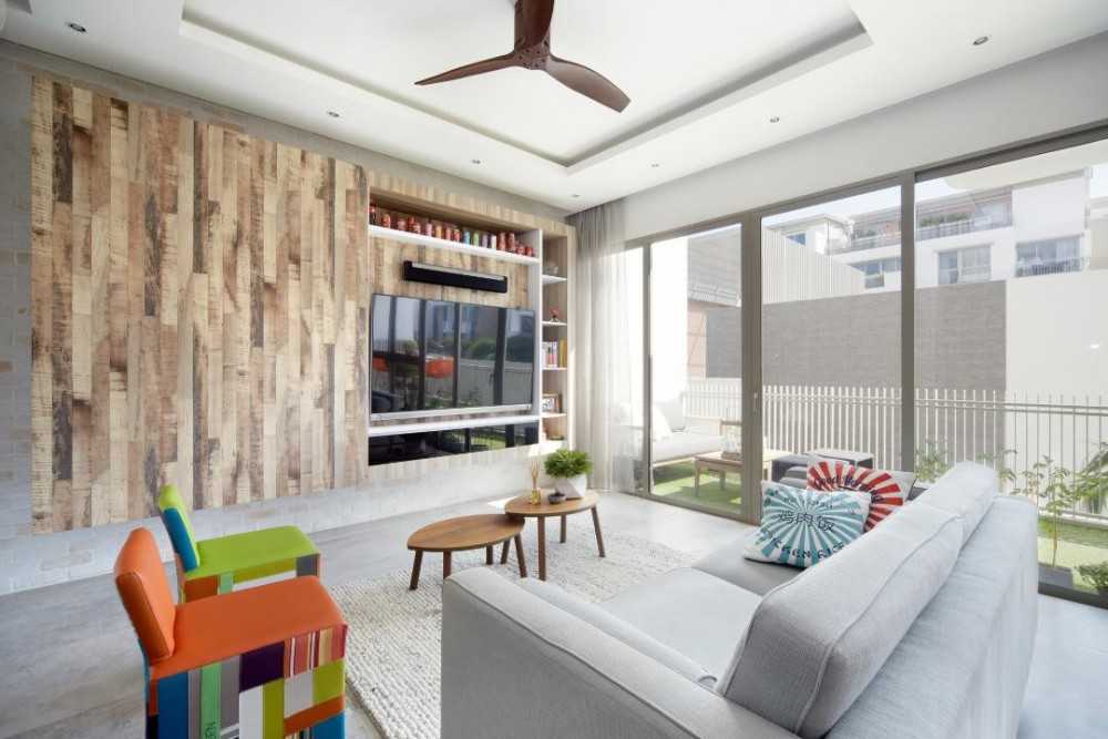 Eclectic Living Room with TV Console and Feature Wall