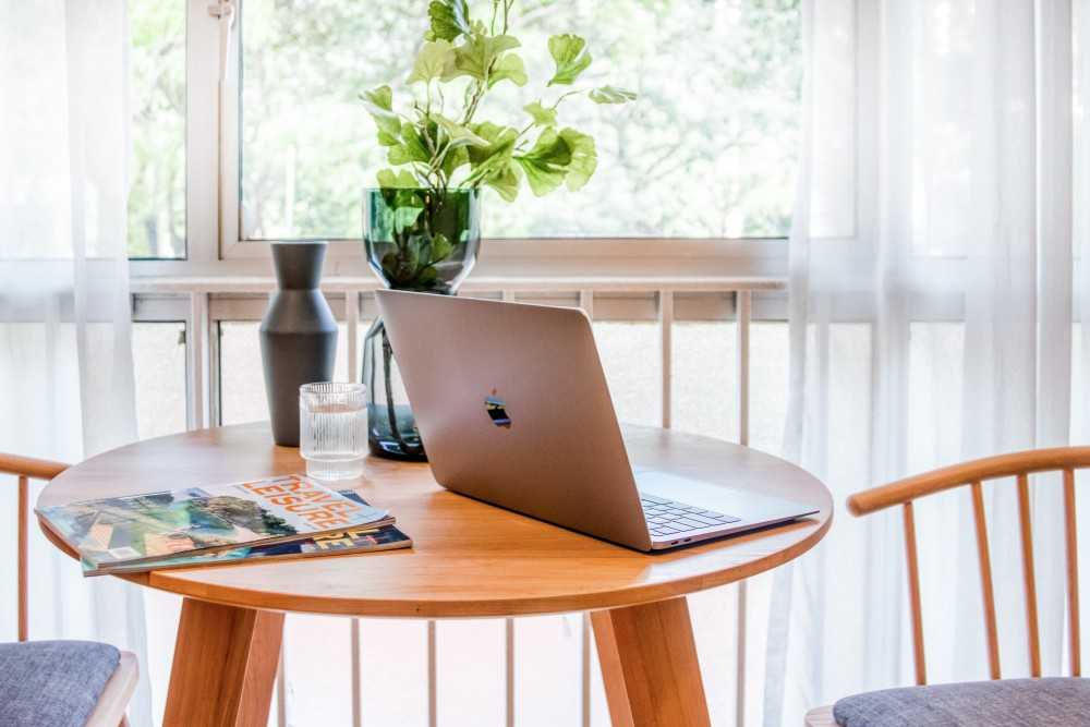 Transitional Balcony with Coffee Table and Computer