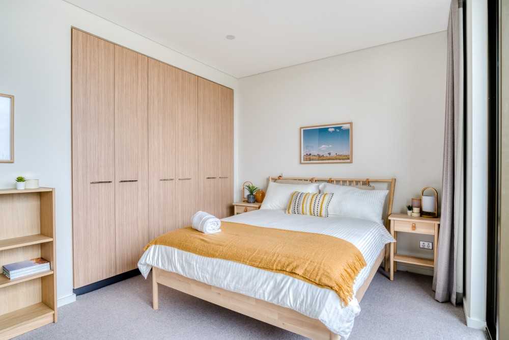 Eclectic Bedroom with Artwork and Wardrobe