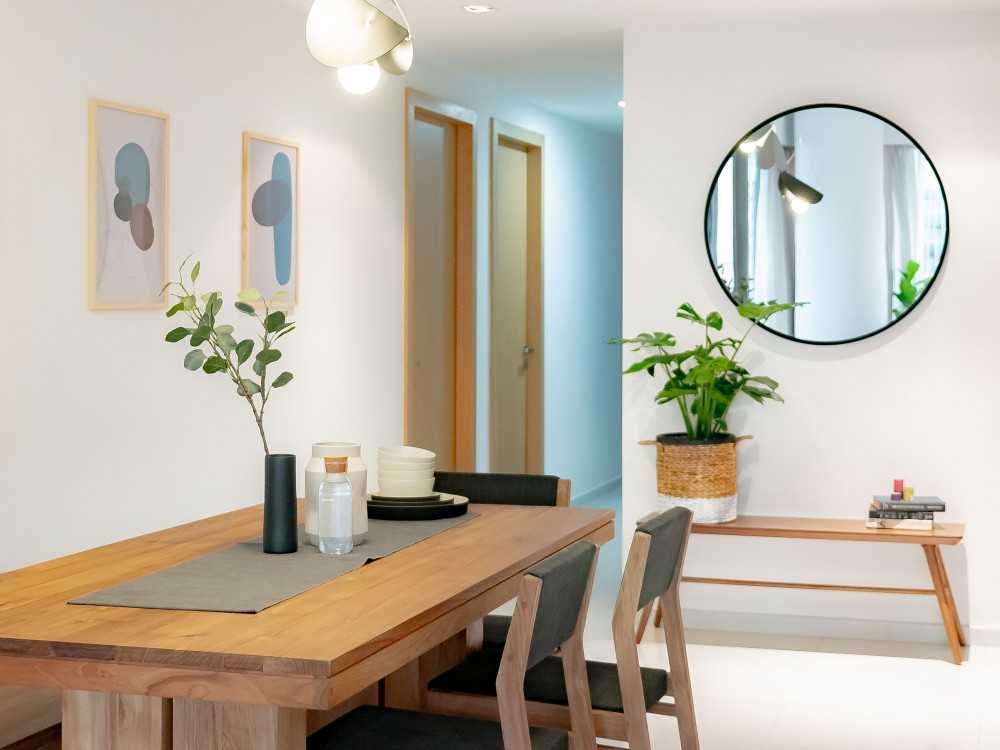 Scandinavian Living Room with Mirror and Mirror Feature Wall
