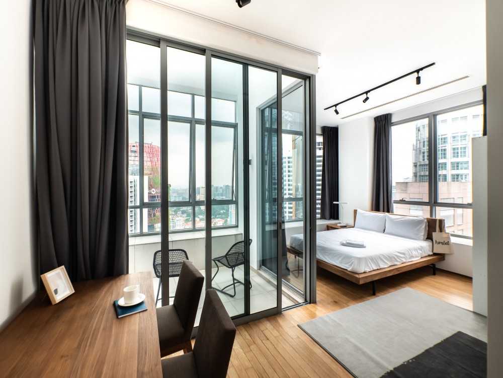 Scandinavian Bedroom with Wood Flooring and Curtain