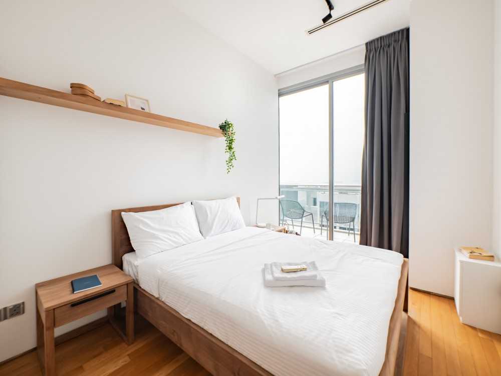 Scandinavian Bedroom with Bedside Table and Queen Bed