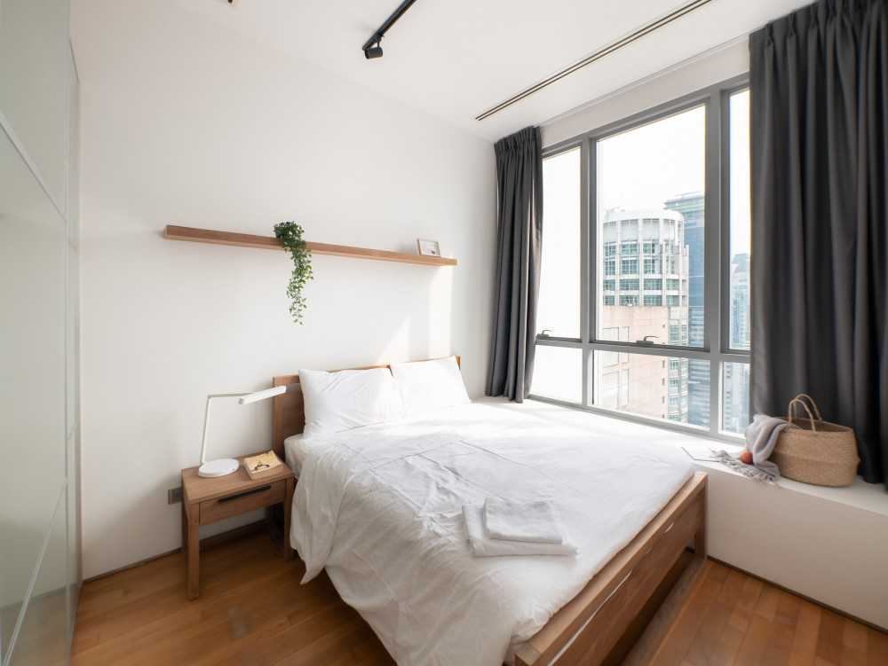 Scandinavian Bedroom with Bay Window and Curtain