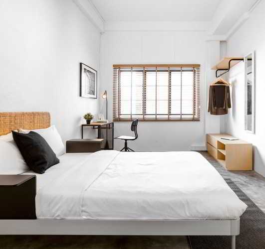 Modern Bedroom with Desk and Desk Chairs